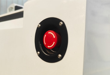 Automated gasket cutter emergency stop button